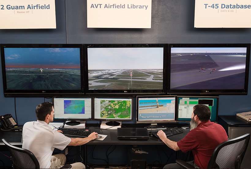 Databases AVT Simualtion AVT Database seven monitor two engineer photo